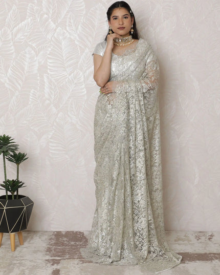 Luxurious Silver Metallic Lace Saree, French-Designed, 110cm Width, Stone Embellishments, 5.5m Length â€“ Blouse Piece Not Included
-D17866 Regal Fabrics