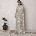 Luxurious Silver Metallic Lace Saree, French-Designed, 110cm Width, Stone Embellishments, 5.5m Length â€“ Blouse Piece Not Included
-D17866 Regal Fabrics