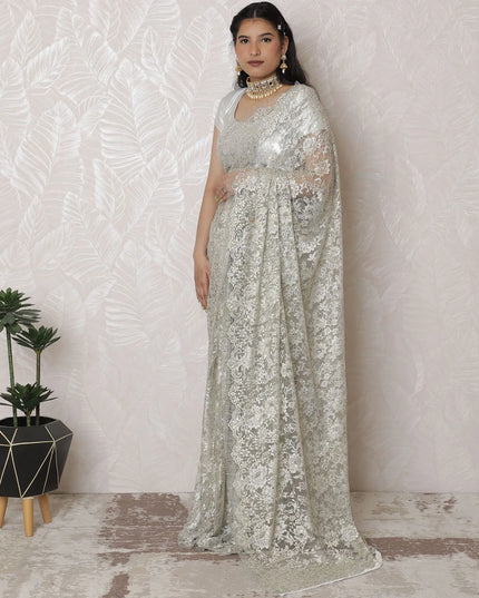 Luxurious Silver Metallic Lace Saree, French-Designed, 110cm Width, Stone Embellishments, 5.5m Length â€“ Blouse Piece Not Included
-D17866 Regal Fabrics