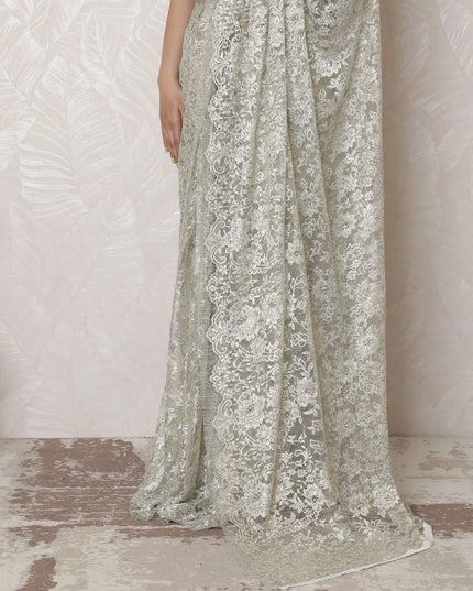 Luxurious Silver Metallic Lace Saree, French-Designed, 110cm Width, Stone Embellishments, 5.5m Length â€“ Blouse Piece Not Included
-D17866 Regal Fabrics