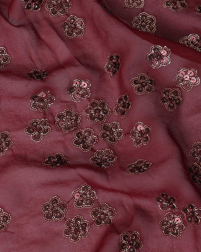 Barn red synthetic georgette fabric with gold and black sequins in floral design-D15817