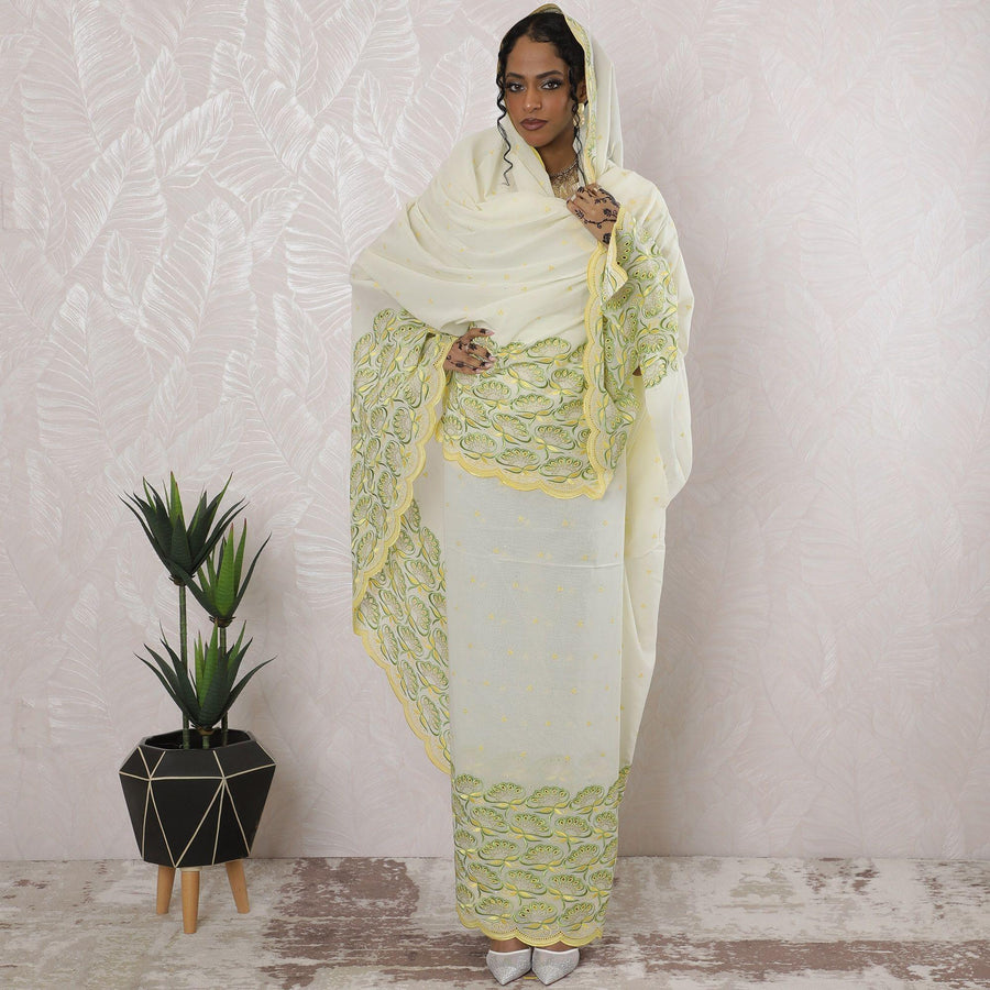 Cream Premium pure Swiss cotton voile thobe with lavender, beige and silver embroidery having stone work in floral design-D16209