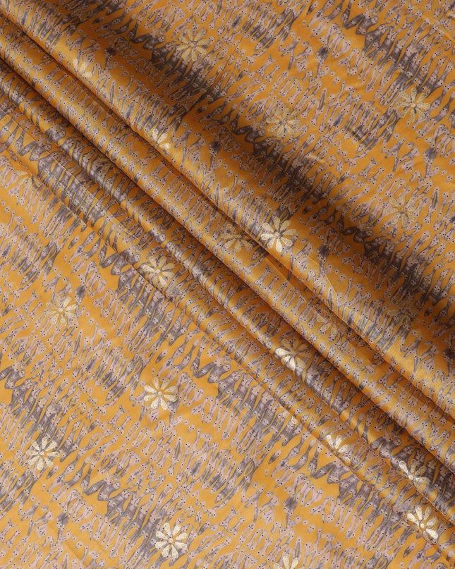 Rusty Peach Premium pure tussar silk fabric with brown, peach and black print having gold print in batik design-D16526