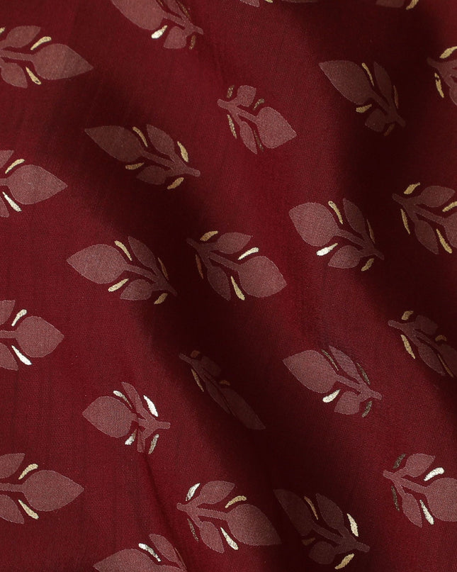 Maroon Synthetic blended cotton fabric with brick red and gold foil print in floral design-D16738