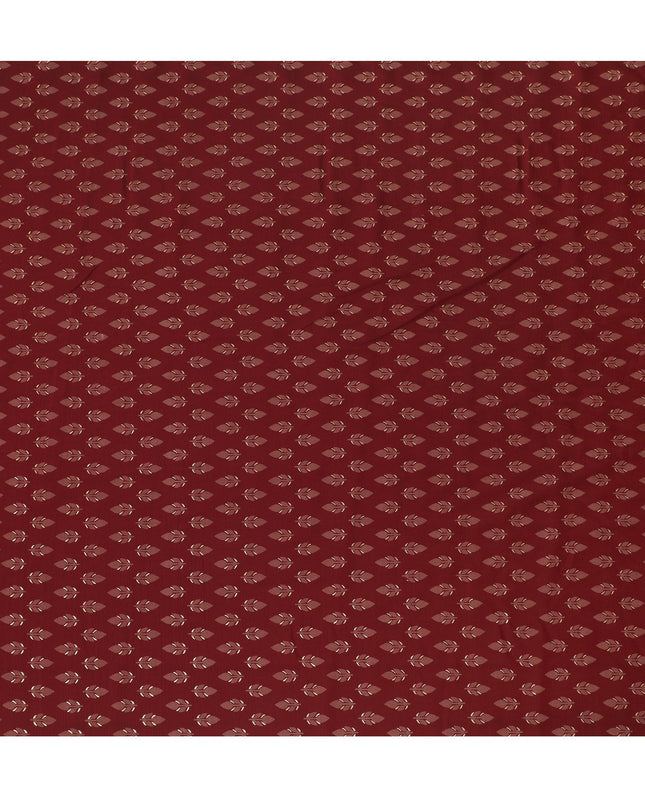 Maroon Synthetic blended cotton fabric with brick red and gold foil print in floral design-D16738