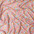 Salmon synthetic satin fabric with multicolor print in floral design-D17051 Regal Fabrics