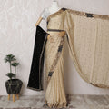 Golden Radiance: Enchanting Synthetic Crepe Saree with Majestic Embroidery-D17499