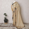 Golden Radiance: Enchanting Synthetic Crepe Saree with Majestic Embroidery-D17499