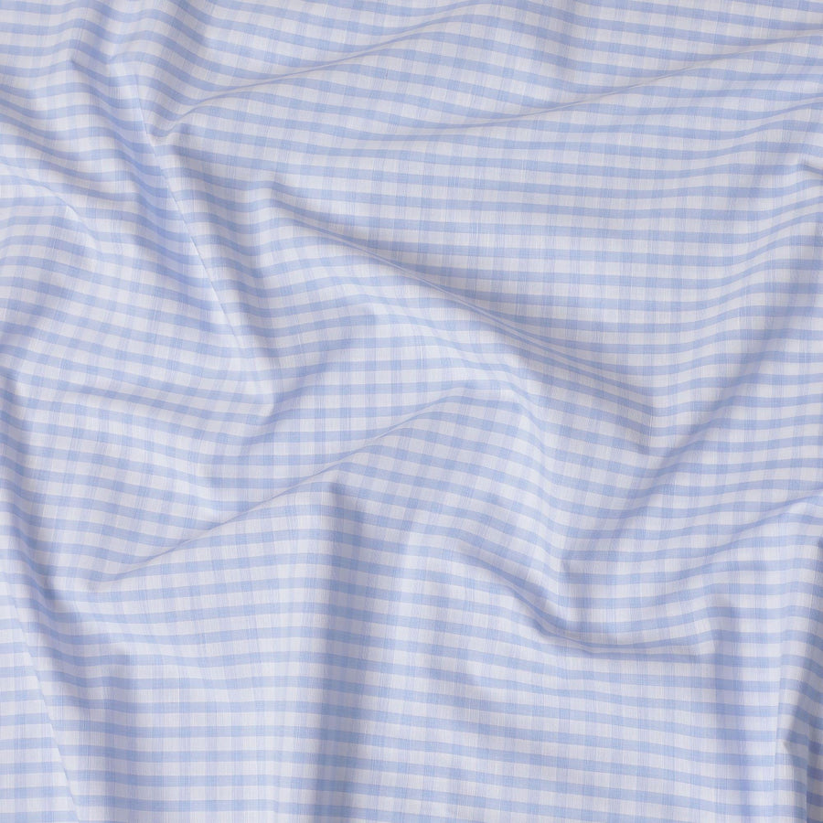 White Premium 100% cotton shirting fabric with turquoise baby blue print in checks design-D16844 Regal Fabrics