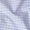White Premium 100% cotton shirting fabric with turquoise baby blue print in checks design-D16844 Regal Fabrics