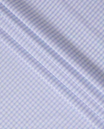 White Premium 100% cotton shirting fabric with turquoise baby blue print in checks design-D16844 Regal Fabrics