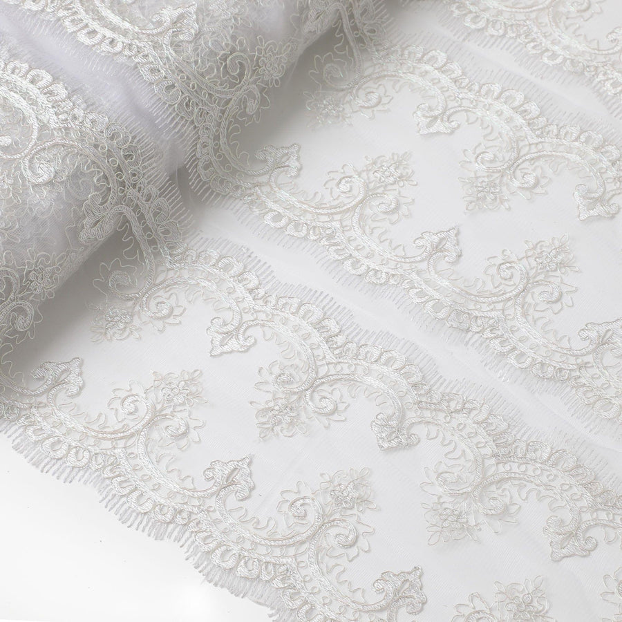 Off white nylon tulle fabric with embroidery and clip cord in floral design