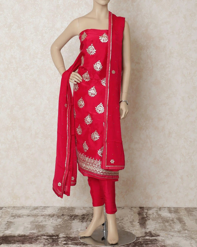 Ruby pink silk kameez with gold gota work embroidery and stone work in floral design. Ruby pink plain salwar having same tone chiffon dupatta with gold embroidery and stone work-D12688 Regal Fabrics