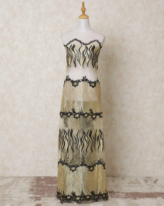 Gold nylon tulle fabric with same tone, black embroidery having stone work in abstract design-D14111 Regal Fabrics