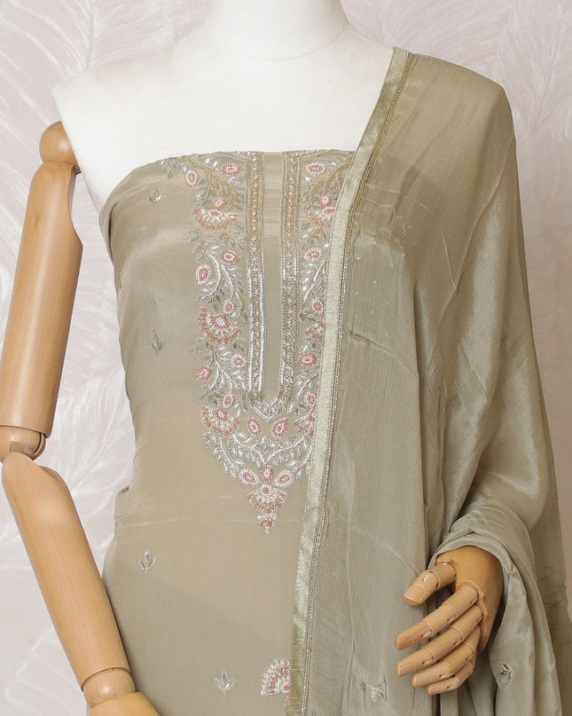 Artichoke green Premium pure silk crepe kameez with same tone embroidery, stone work and bead work in floral design. Artichoke green Plain salwar with same tone chiffon dupatta having same tone embroidery and stone work-D15570