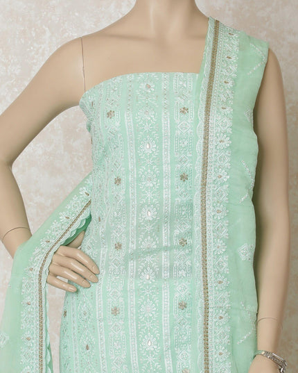 Turquoise green synthetic georgette kameez with same tone, gold embroidery having sequins in floral design. Turquoise green plain salwar with same tone chiffon dupatta having gold embroidery-D12633