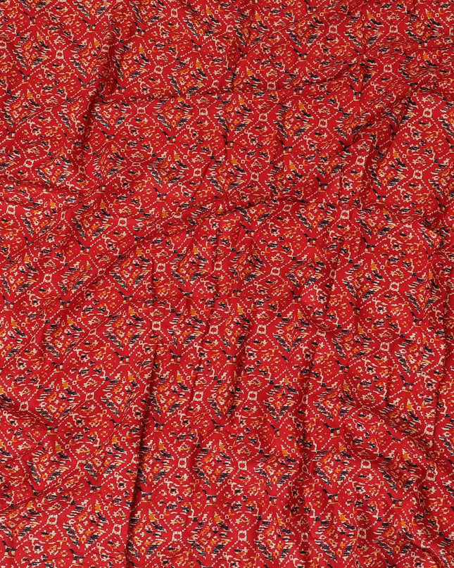 Crimson red cotton viscose fabric with black, orange and gold print in batik design-D14192 Regal Fabrics