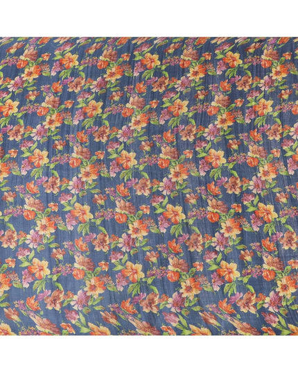 Petrol blue tussar silk fabric with olive green, tangerine orange, blonde yellow and light plum print in floral design-D6140 Regal Fabrics