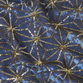 Beige nylon tulle fabric with azure blue and gold sequins in abstract design Regal Fabrics