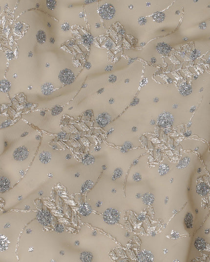 Parmesan Beige fabric with beige embroidery and silver glitters in floral design