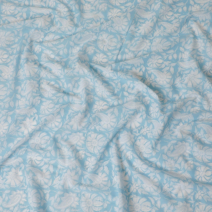 White cotton voile fabric with baby blue print in floral design-D15416