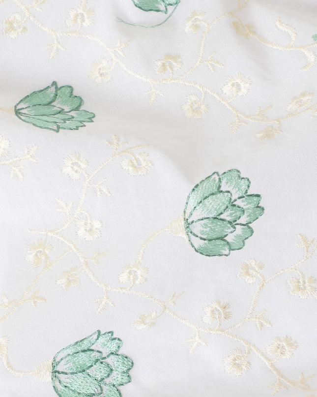 Off white cotton voile fabric with beige and sage green embroidery in floral design-D11938