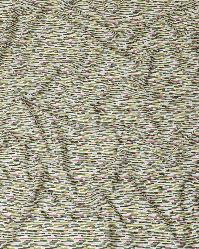 Off white cotton lawn fabric with lime green, pale brown and green print in fancy design-D15228