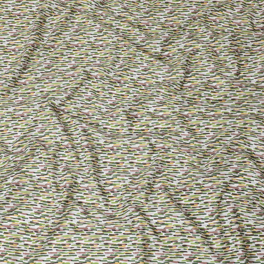 Off white cotton lawn fabric with lime green, pale brown and green print in fancy design-D15228