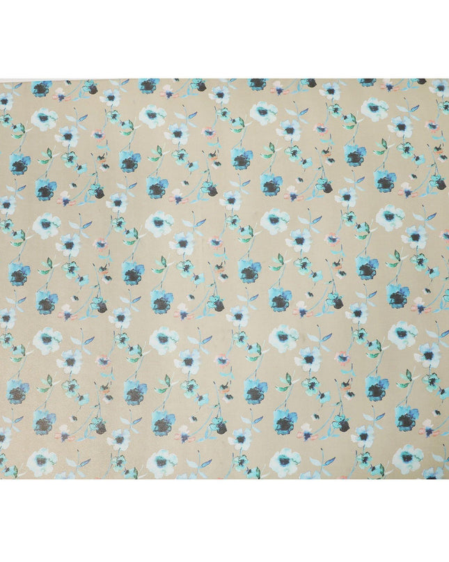 قماش من الشيفون الحريري باللون البيج اللاتيه مع طباعة باللون الأزرق الفيروزي والأسود وأزرق المايا بتصميم الأزهار