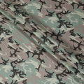 Laurel green Italian viscose fabric with pale brown and black print in abstract design-D12350