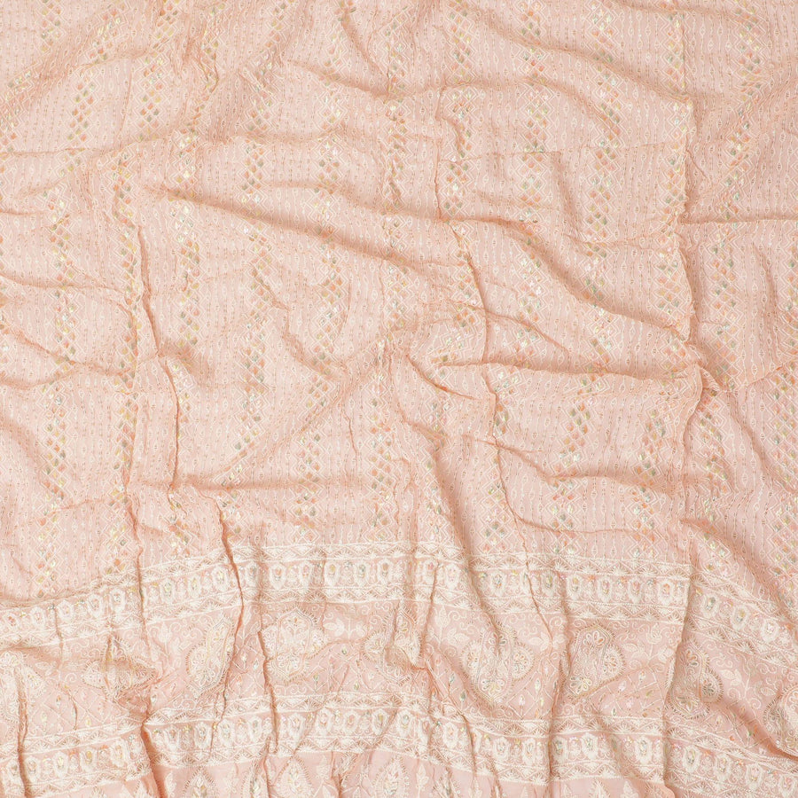 Peach premium synthetic georgette fabric with multicolor embroidery having gold metallic lurex in chikankari design-12450 Regal Fabrics