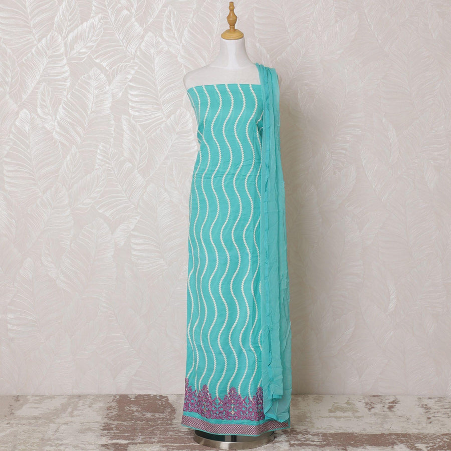 Turquoise blue blended cotton lawn fabric with white, lavender pink, gold embroidery in floral design-D15074