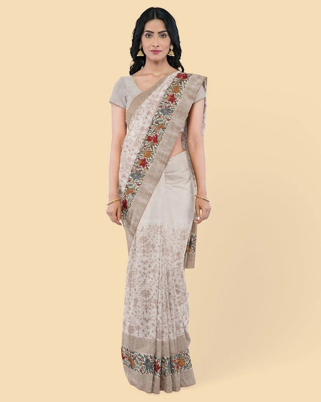 Oyster pink synthetic chiffon saree with multicolor embroidery, sequins and stone work in floral design. Same color blouse piece-D12758 Regal Fabrics