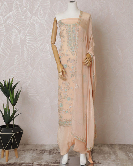 Light peach Premium pure silk crepe kameez with mint green embroidery, sequin work and stone work in floral design. Light peach plain salwar with same tone chiffon dupatta with same tone embroidery and bead work-D15577