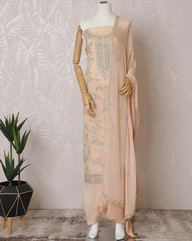 Light peach Premium pure silk crepe kameez with mint green embroidery, sequin work and stone work in floral design. Light peach plain salwar with same tone chiffon dupatta with same tone embroidery and bead work-D15577