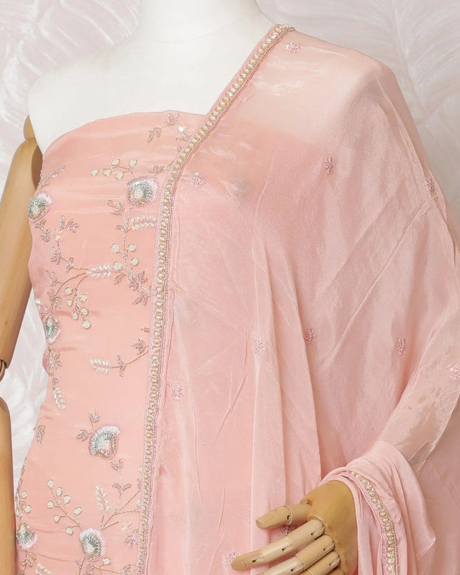 Salmon peach silk crepe kameez with same tone, vista blue embroidery, bead work and sequin work in floral design. Salmon peach plain salwar with chiffon dupatta having with same tone embroidery and bead work-D15531 Regal Fabrics