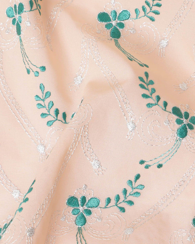 Light peach Premium 100% Swiss cotton voile (Sudanese Thobe) fabric with teal green and silver embrodiery in floral design-D13519