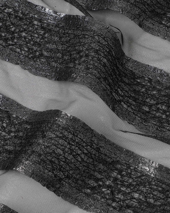 Black nylon tulle fabric with silver metallic stripe in abstract design