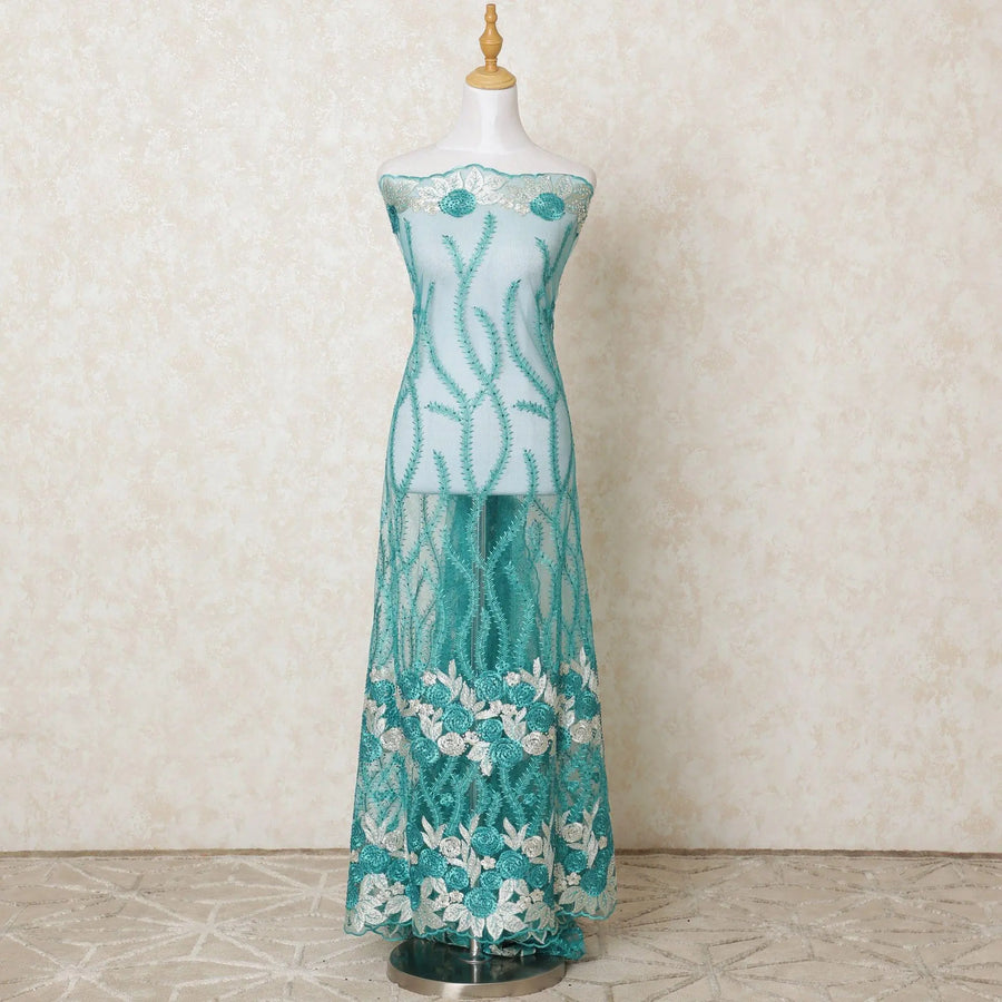 Turquoise green nylon tulle fabric with same tone, beige embroidery having stone work in floral design-D12208 Regal Fabrics