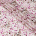 Off white synthetic crepe fabric with magenta purple, brown and black print in floral design-D11035