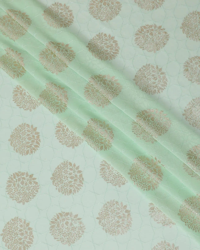 Mint green synthetic georgette fabric with same tone embroidery having gold foil printed in floral design-D12228 Regal Fabrics