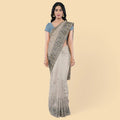 Mushroom gray synthetic chiffon saree with multicolor embroidery in floral design. Powder blue color blouse piece-D12755 Regal Fabrics