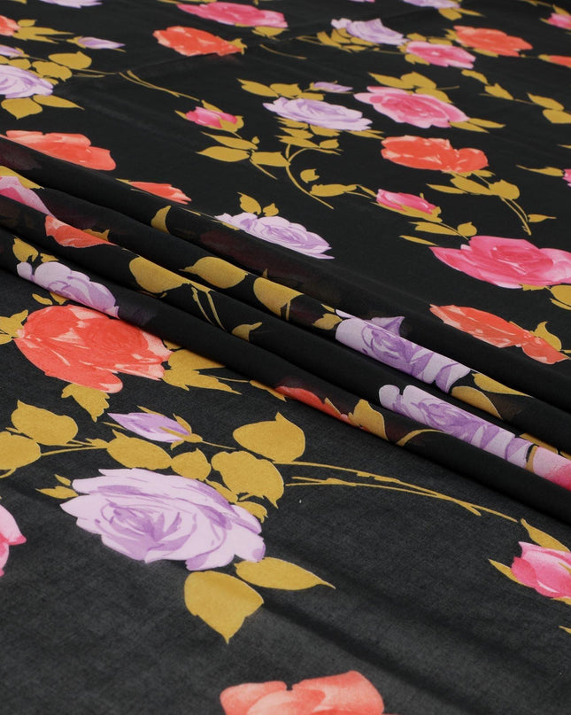 Black Swiss cotton voile fabric with gold, creamy pink and lilac print in floral design