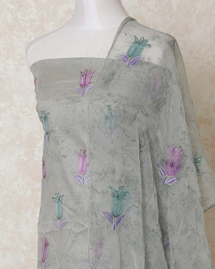 Cloud grey blended cotton lawn fabric with same tone embroidery having multicolor print and stone work in floral design-D12113