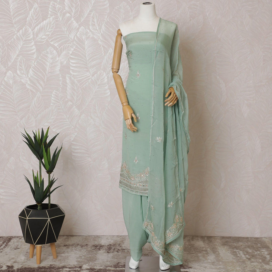 بروك جرين كريب كاميز من الحرير الخالص الفاخر مع أعمال الخرز والترتر والحجر بتصميم الأزهار. بروك سراويل خضراء سادة مع نفس اللون من الشيفون مع تطريز بنفس اللون والخرز -D15578