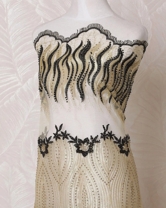 Gold nylon tulle fabric with same tone, black embroidery having stone work in fancy design-D14710 Regal Fabrics