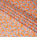 Orange cotton lawn fabric with off white, silver grey and copper brown print in floral design-D10848