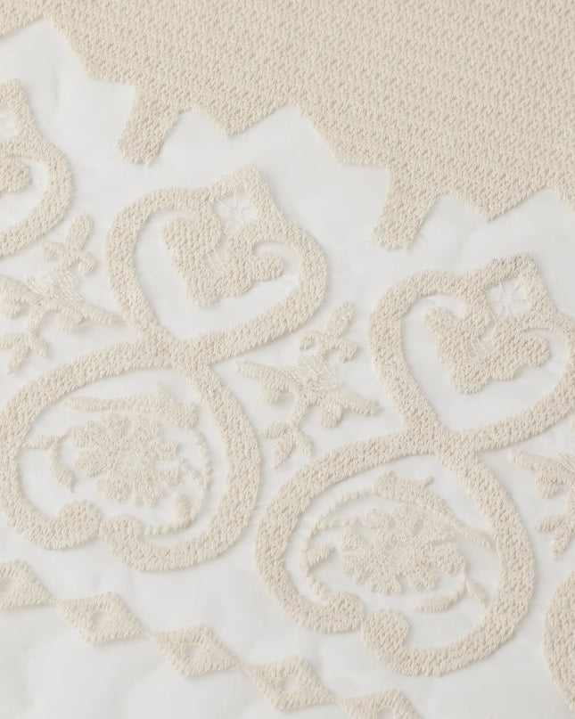 Off white soft nylon tulle fabric with cream color thread embroidery in floral design Regal Fabrics