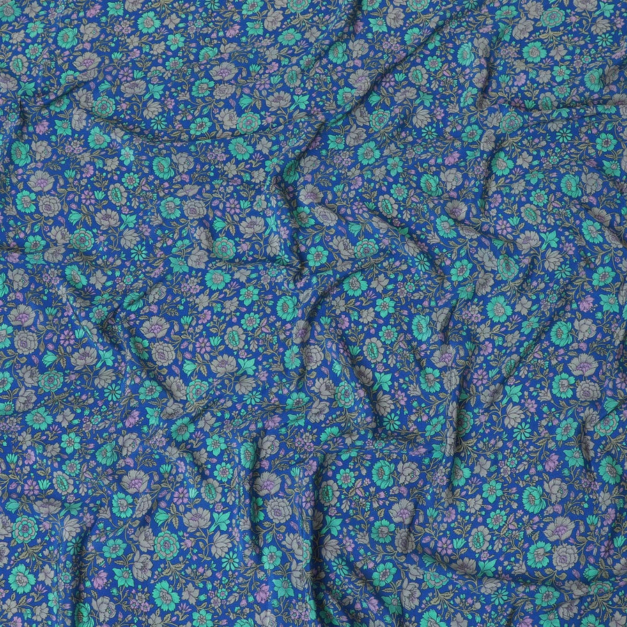 Royal blue silk crepe fabric with turquoise green, grey and lilac print in floral design-D8456 Regal Fabrics