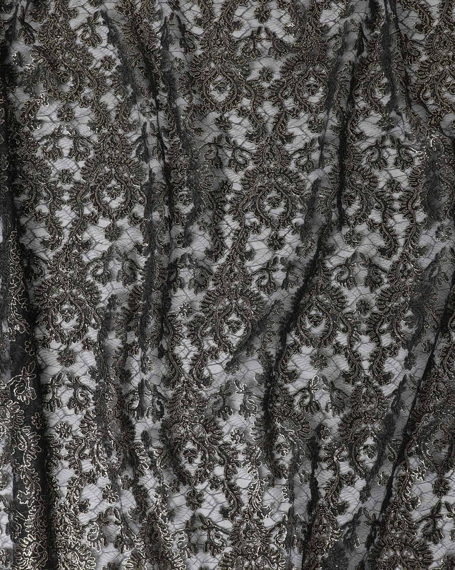 Black nylon tulle fabric with gold embroidery in fancy design